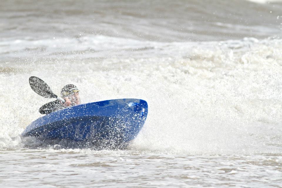 Blue Tootega Pulse 85 Blue Tootega Pulse 85 being surfed by person on sea